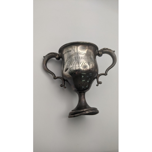 189 - A Joseph Rodgers and Sons twin handled trophy cup inscribed London chemists golfing society hallmark... 