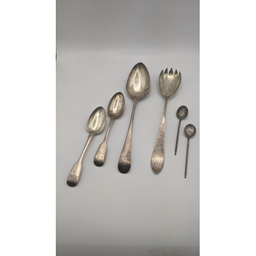 191 - Silver cutlery to include a salad servers spoon, two tea spoons, two coffee spoons and a serving spo... 