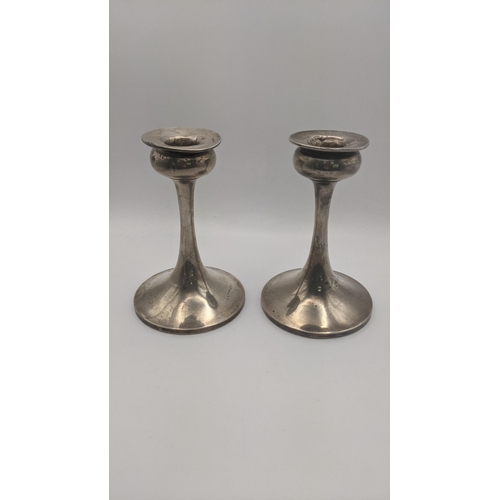 193 - A pair of weighted candle sticks 14cm H and one other 
Location:A3B
If there is no condition report ... 