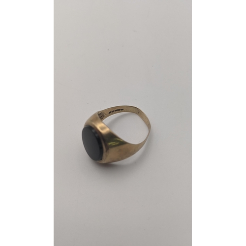 208 - A 9ct gold gent's black onyx signet ring 6.3g, together with a gold plated open faced keyless pocket... 