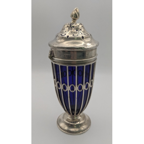 211 - A Haseler Brothers silver sugar caster hallmarked London 1900 with a pierced lined body and a blue g... 