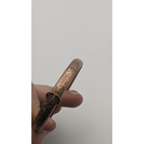 219 - A 9ct Rose gold bangle fashioned as a belt 8.6g
Location:CAB1
If there is no condition report shown,... 