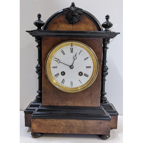 266 - A 19th century French 8 day walnut and ebonised mantle clock, striking on a single bell 28h
Location... 