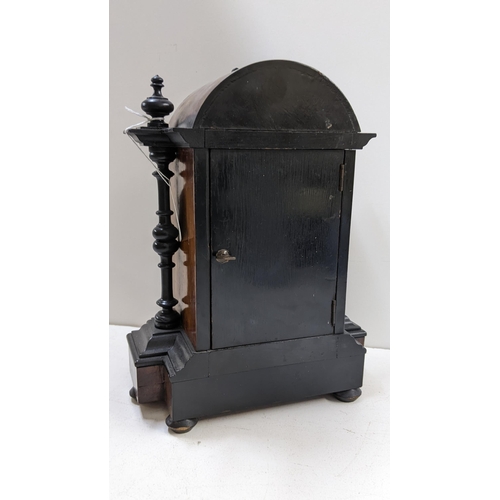 266 - A 19th century French 8 day walnut and ebonised mantle clock, striking on a single bell 28h
Location... 