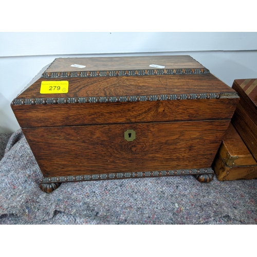 279 - A tea caddy of sarcophagus form and four boxes, one with mother of pearl inlay, one with hinged lid ... 