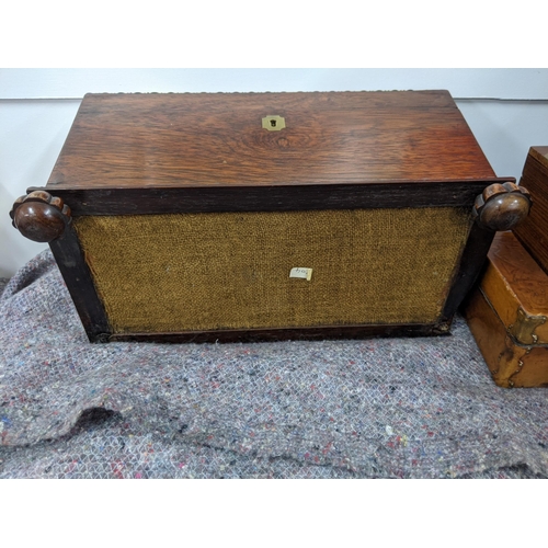 279 - A tea caddy of sarcophagus form and four boxes, one with mother of pearl inlay, one with hinged lid ... 