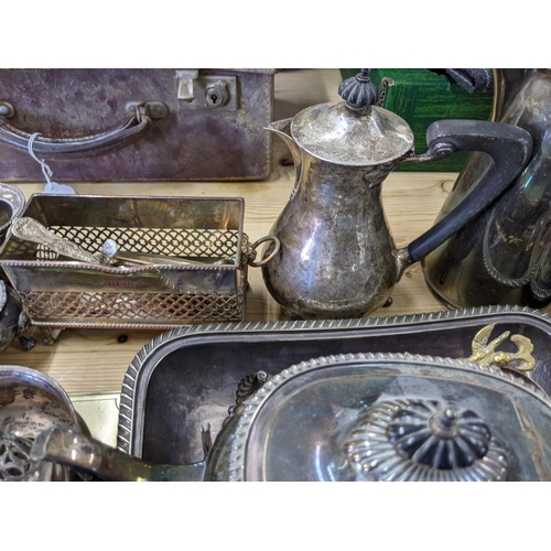 280 - Silver plate and EPNS items to include candlesticks, coffee pots, one with a Walrus tusk handle, a t... 