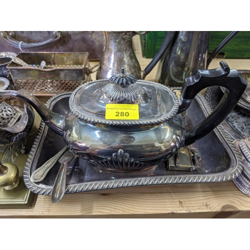 280 - Silver plate and EPNS items to include candlesticks, coffee pots, one with a Walrus tusk handle, a t... 