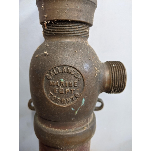 281 - A cast iron water hand pump red along with Stynip water pump with a hose, inscribed 'Abbot Birks & c... 