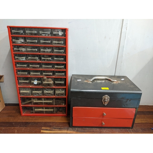 284 - A tool chest with a storage unit containing screws, plugs, pins, caps and other items
Location:RAM
I... 