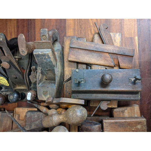 285 - A large collection of woodworking planes also including flathead screwdrivers
Location:A4M
If there ... 