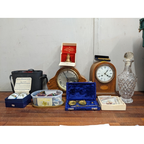 330 - A mixed lot to include two early 20th century mantle clocks, some postage scales, some cloth badges ... 