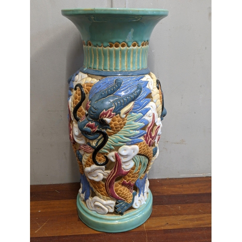 367 - An Oriental inspired hat stand with pierced design decorated with dragons with a flared rim Location... 