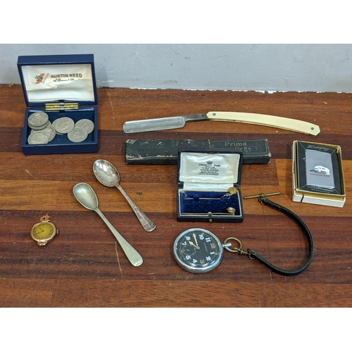 368 - A mixed lot of collectables to include a cut throat razor, a Zippo lighter, hat pins, some miscellan... 