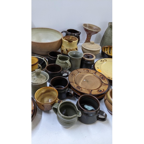 402 - A selection of studio pottery to include Leach, early Winchcombe and others 
Location: 11-4
If there... 