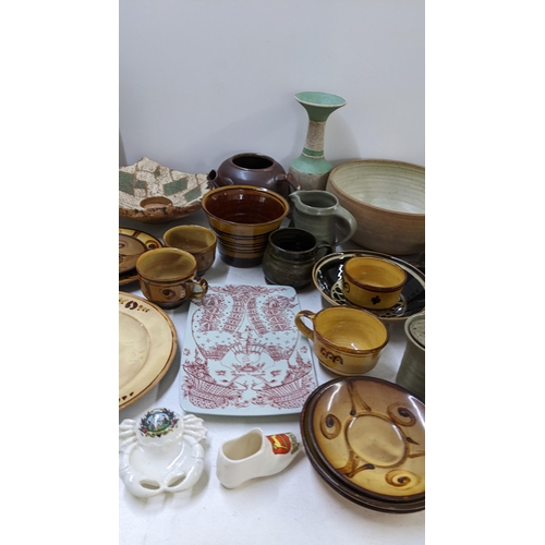 402 - A selection of studio pottery to include Leach, early Winchcombe and others 
Location: 11-4
If there... 