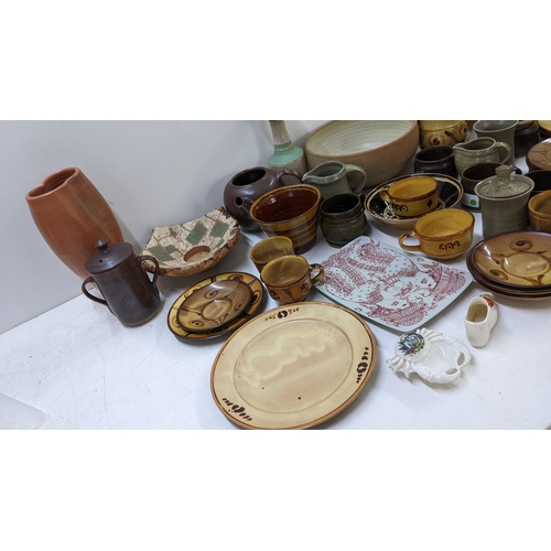 402 - A selection of studio pottery to include Leach, early Winchcombe and others 
Location: 11-4
If there... 