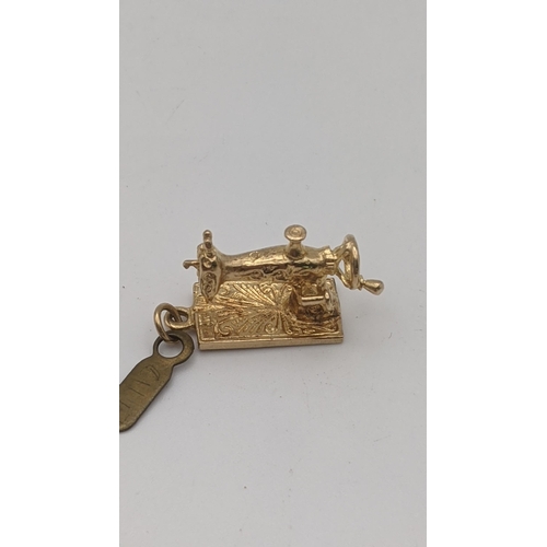 88 - Four 9ct gold charms to include on fashioned as a pocket knife, another as a sewing machine and two ... 