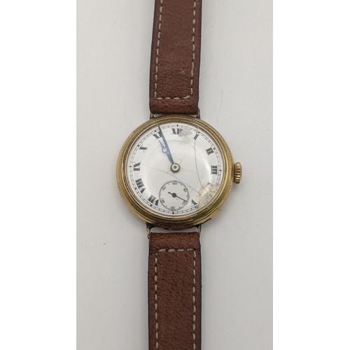 94 - An 18ct gold gents wristwatch A/F on a brown leather strap, total weight 35.8g, 
Location: CAB 2
If ... 