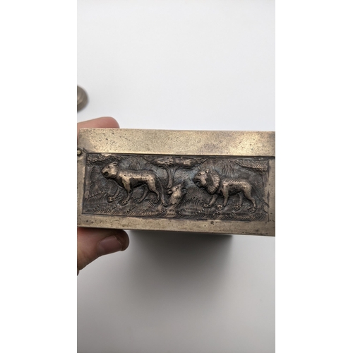 99 - India white metal to include an embossed box wit hinged lid depicting hunters and animals and an emb... 