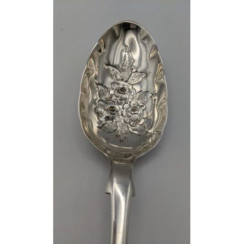 127 - A William Fountain fiddle pattern berry spoon hallmarked London 1838 having an embossed bowl and eng... 
