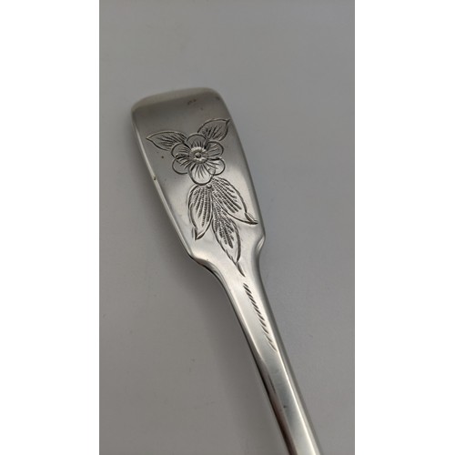 127 - A William Fountain fiddle pattern berry spoon hallmarked London 1838 having an embossed bowl and eng... 