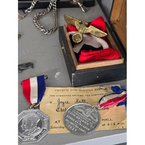 407 - A mixed lot of interest to include a cased set of 5 silver school medals and chain, a piece of cloth... 