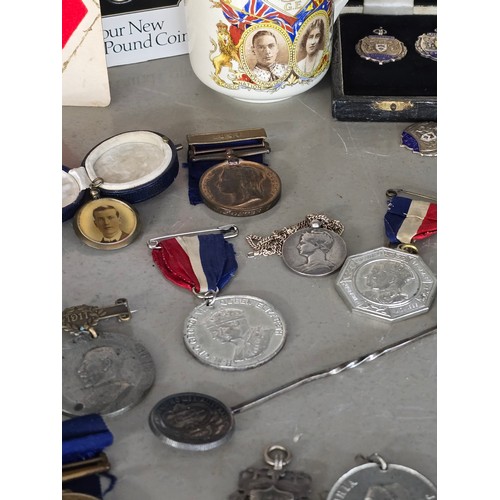 407 - A mixed lot of interest to include a cased set of 5 silver school medals and chain, a piece of cloth... 