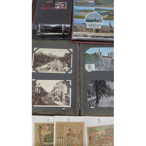 398 - Four postcard albums to include postcards from Snowdon, Thompson River and others, along with a quan... 