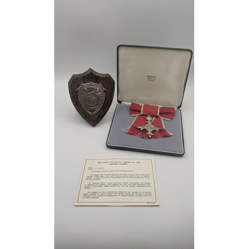 232 - A mixed lot to include a cased Order of the British Empire medal, Civilian Female MBE, together with... 