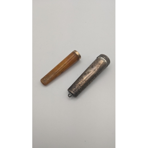 233 - Smoking related items to include an amber and 9ct gold cheroot, together with silver cheroot case wi... 