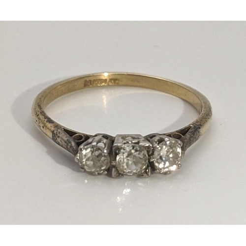 248 - An 18ct gold and three stone diamond ring size Q 1/2, 2.6g Location:CAB6
If there is no condition re... 