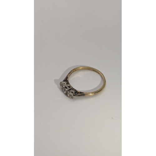 248 - An 18ct gold and three stone diamond ring size Q 1/2, 2.6g Location:CAB6
If there is no condition re... 