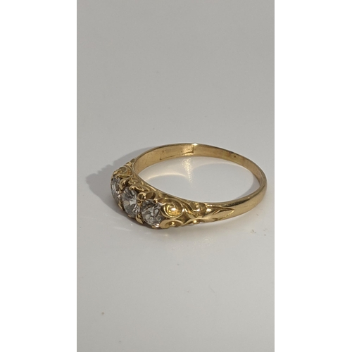 250 - A Victorian gold and three stone diamond ring tested as 22ct gold size T, 3.4g Location:RING
If ther... 