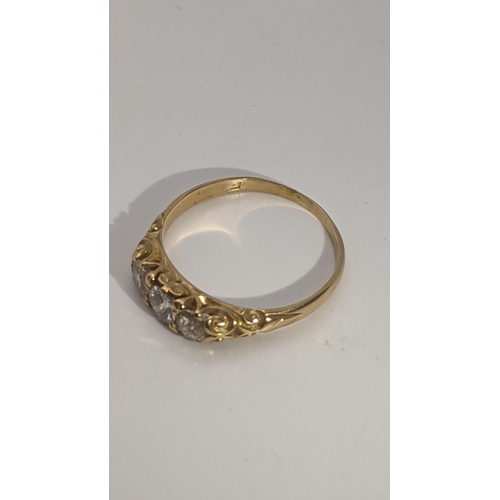 250 - A Victorian gold and three stone diamond ring tested as 22ct gold size T, 3.4g Location:RING
If ther... 