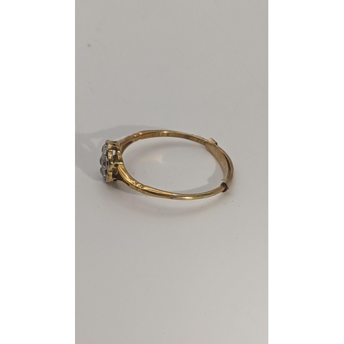 251 - An 18ct gold and diamond daisy ring, 1.9g Location:RING
If there is no condition report shown, pleas... 