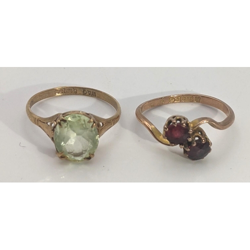 253 - Two 9ct gold ladies rings to include one set with garnets, total weight 3.7g Location:CAB2
If there ... 