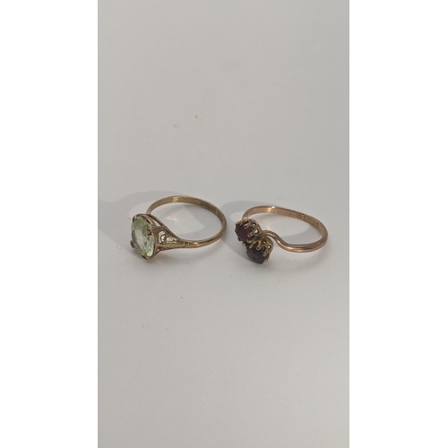 253 - Two 9ct gold ladies rings to include one set with garnets, total weight 3.7g Location:CAB2
If there ... 