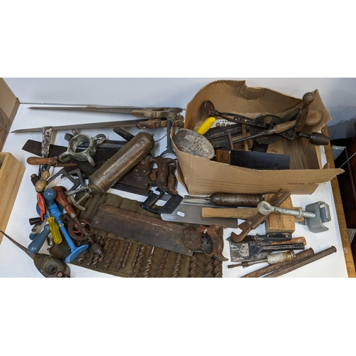 200 - Vintage tools to include saws, an oil can, drill bits, drills and other items Location:G
If there is... 