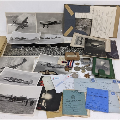 258 - A mixed lot of mainly WW2 RAF related items to include medals, photographs, letters and other items ... 