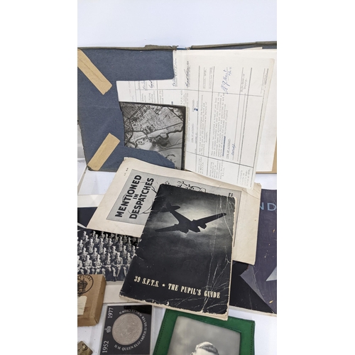 258 - A mixed lot of mainly WW2 RAF related items to include medals, photographs, letters and other items ... 