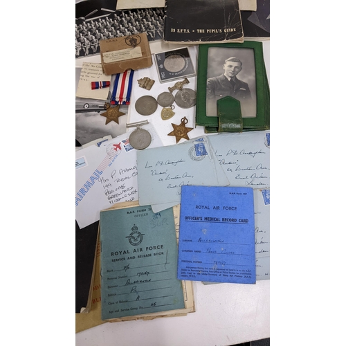 258 - A mixed lot of mainly WW2 RAF related items to include medals, photographs, letters and other items ... 