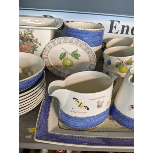 380 - A Wedgwood tea service 'Sarah's Garden' pattern to include a sugar bowl, lemon squeezer cups and sau... 