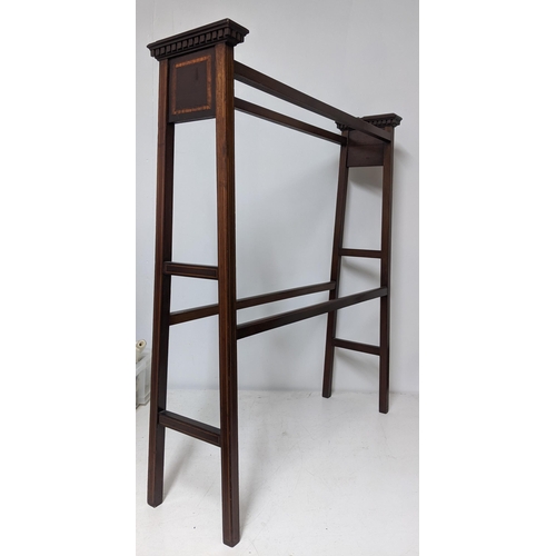 387 - An Edwardian inlaid mahogany towel rail Location: G
If there is no condition report shown, please re... 