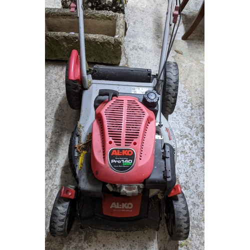 389 - An AL-KO Pro 140 QSS petrol lawnmower with grass box Location: G
If there is no condition report sho... 