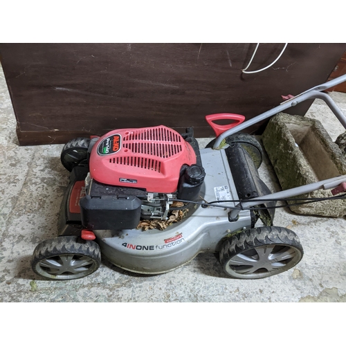 389 - An AL-KO Pro 140 QSS petrol lawnmower with grass box Location: G
If there is no condition report sho... 