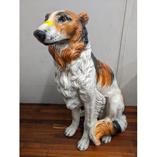 432 - A life size Italian ceramic floor standing statue/figure of a rough collie in a seated position, 73.... 