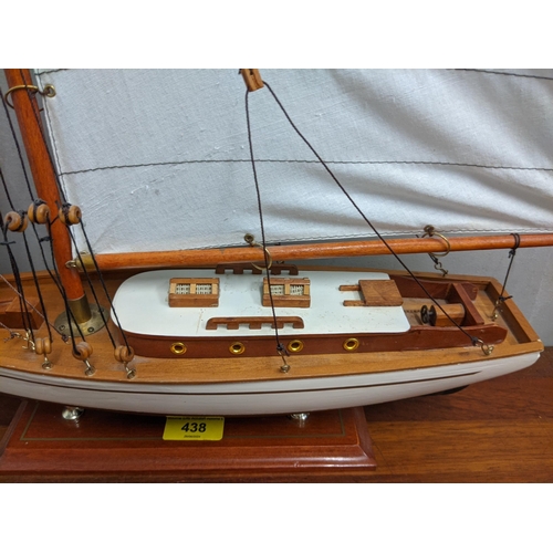 438 - A model of a yacht together with three nautical figures, 52cm h
Location:RAM
If there is no conditio... 