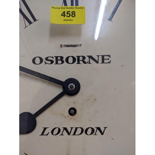 458 - An Osborne wall clock with London underneath in an oak case with a roman dial and a white face (two ... 