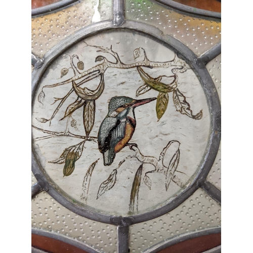 459 - A stained glass window panel decorated with greens, reds and oranges with a kingfisher in the middle... 